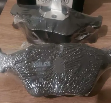 Тормозные колодки Miles (Low-Metallic). Артикул E400387