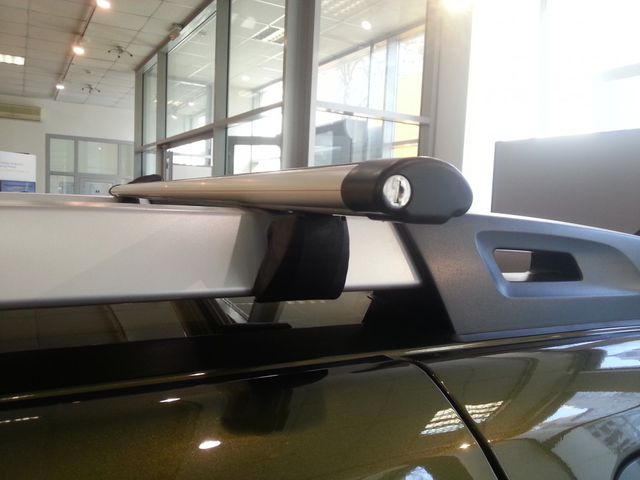 Багажник на широкие рейлинги INTER для Renault Duster 5-дв. I рестайлинг 2015-2020 (Аэродинамические дуги с замком). Артикул 5516+1105