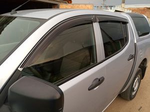 Дефлекторы Cobra Tuning для окон Mitsubishi L200 2006-2015. Артикул M40507