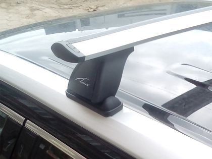 Багажник на крышу LUX на штатные места для Toyota Highlander III 2013-2019 (Крыловидные дуги). Артикул 842129+846066