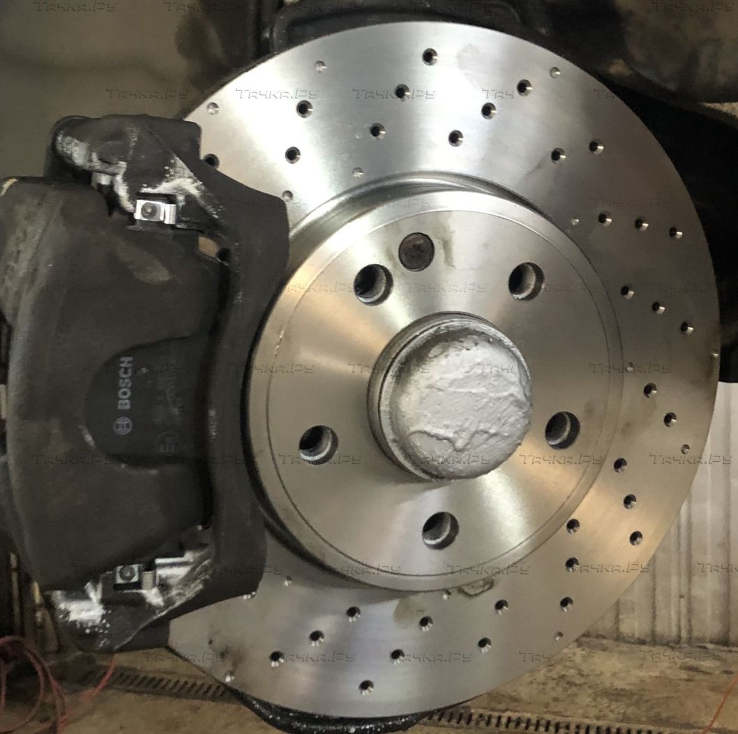 Тормозной диск Miles передний для Volkswagen Passat B5 2000-2005. Артикул K001698