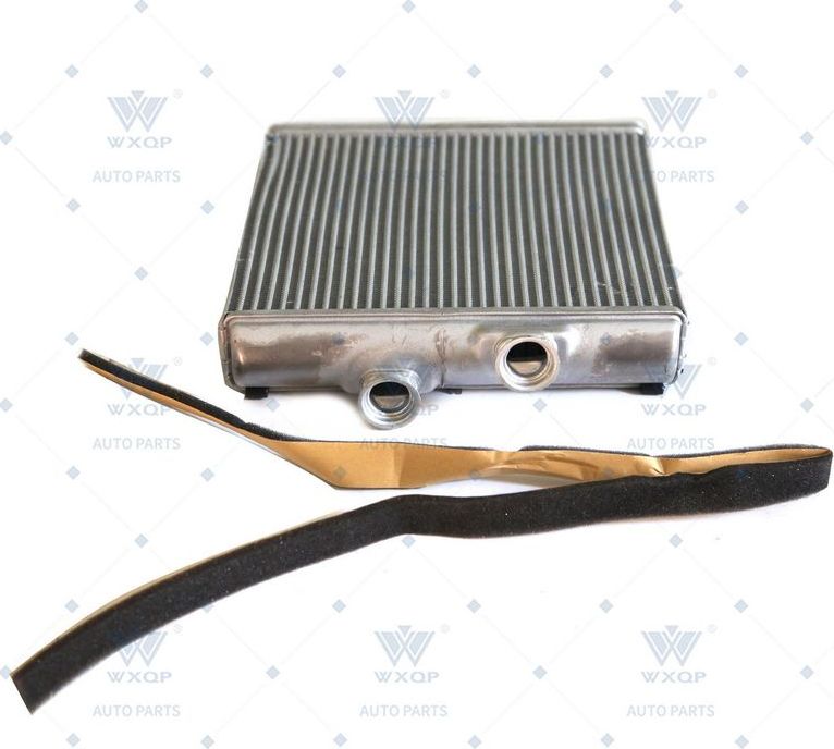 Радиатор отопителя (печки) Wxqp. Артикул 121347
