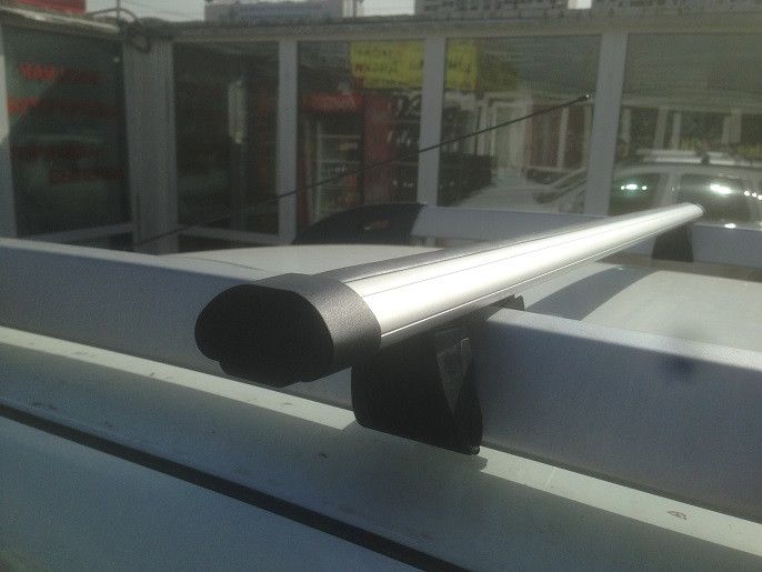 Багажник на широкие рейлинги INTER для Renault Duster 5-дв. I рестайлинг 2015-2020 (Аэродинамические дуги). Артикул 55161005