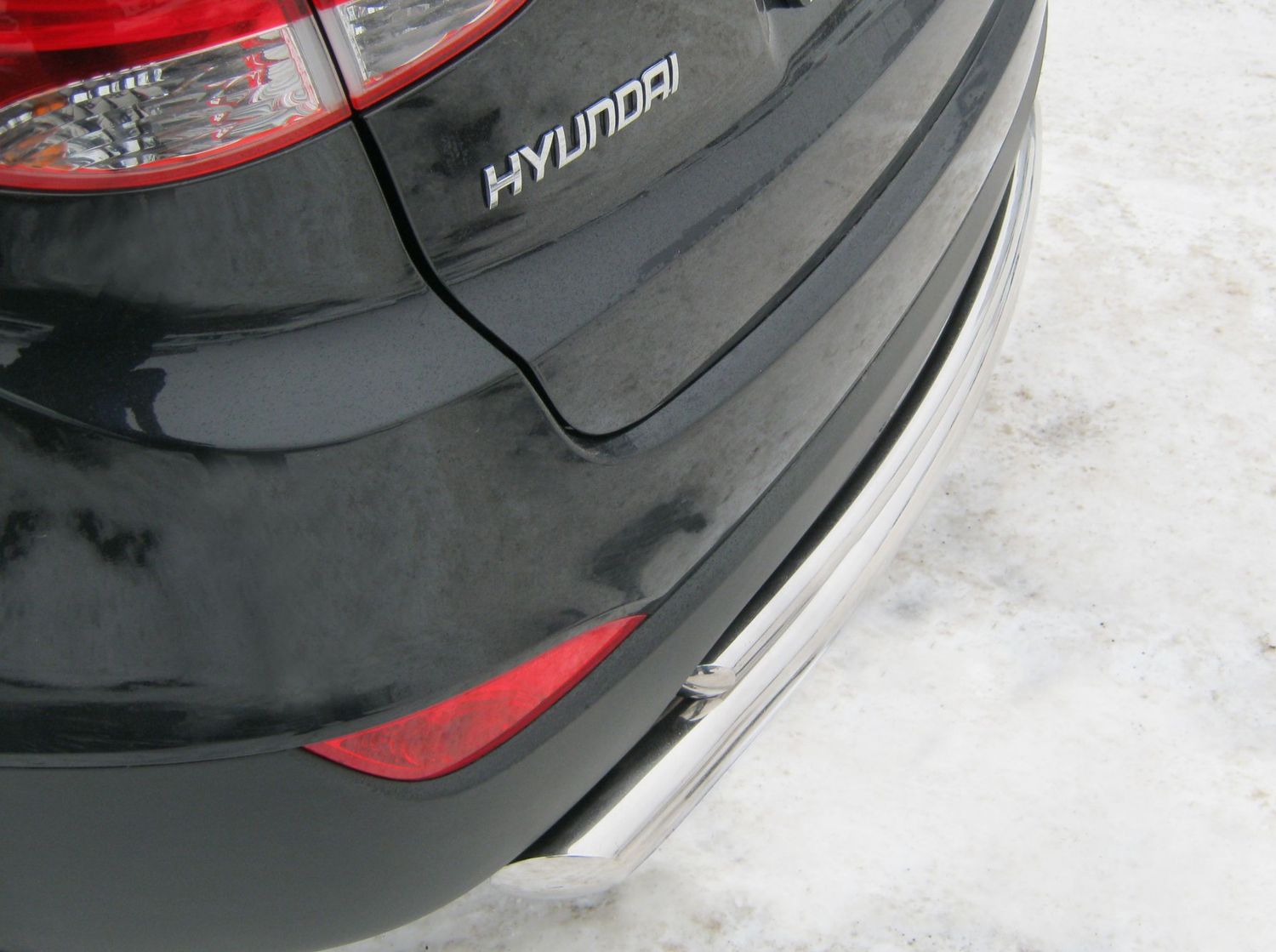 Защита RusStal заднего бампера d63/42 (дуга) для Hyundai ix35 2009-2026. Артикул HIZ-000183