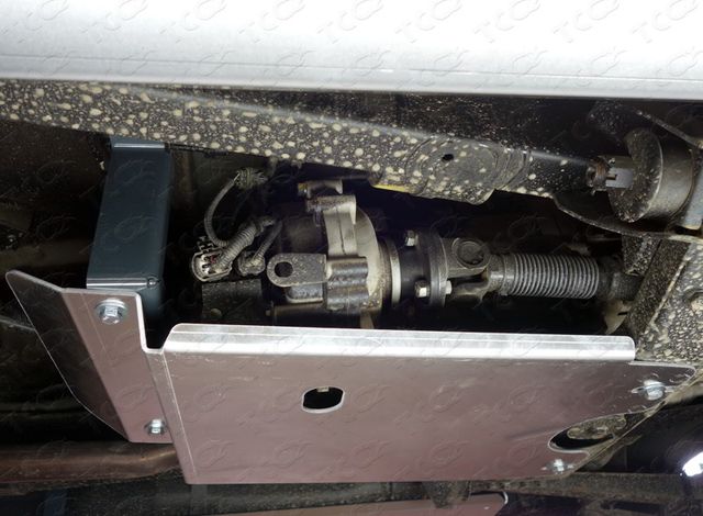 Защита алюминиевая ТСС (4 мм) для раздаточной коробки УАЗ Патриот I рестайлинг (с одним баком пласт.) 2014-2026. Артикул ZKTCC00119