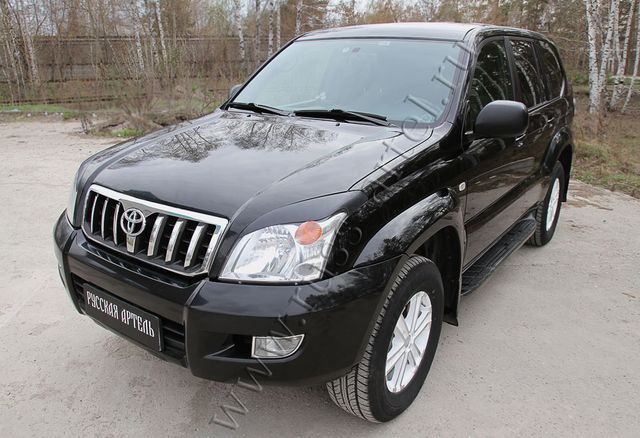 Накладки Русская Артель на передние фары (реснички) для Toyota Land Cruiser Prado 120 2002-2009. Артикул RETP2-012500