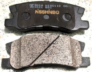 Тормозные колодки Nisshinbo задние для Mitsubishi Pajero II 1999-2000. Артикул NP3004