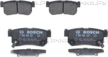 Тормозные колодки Bosch (Low-Metallic) задние для SsangYong Actyon II 2012-2015. Артикул 0 986 494 237