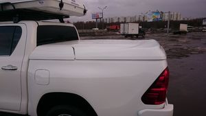 Крышка кузова АВС-Дизайн для Toyota Hilux Revo 2015-2025 с двойной кабиной. Под покраску. Артикул ABC.TOHIL.HTC.02P