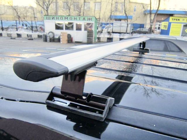 Багажник на крышу INTER C-15 на штатные места для Fiat Stilo хэтчбек 3/5-дв. 2002-2007 (Аэро-крыло дуги). Артикул 5519+1206