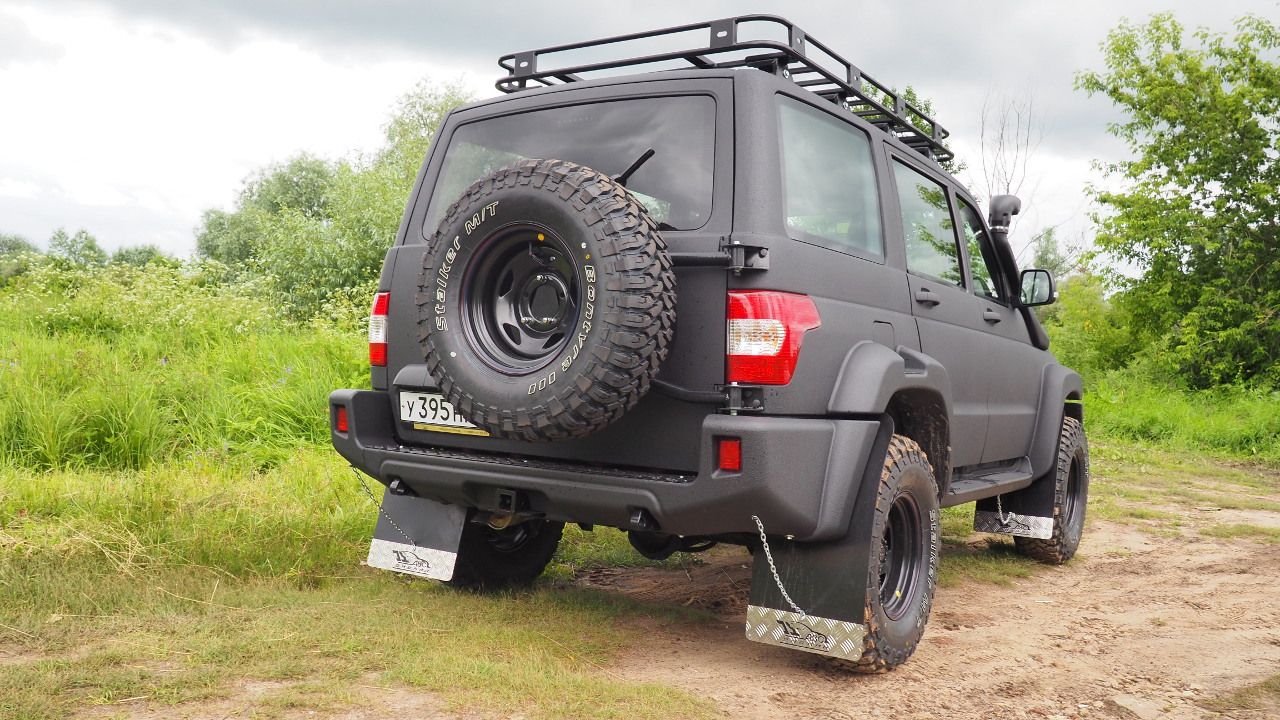 Бампер задний силовой “М” АВС-Дизайн для УАЗ Patriot 2014-2026 с лифтом положения кузова 0-65 мм. С квадратом под фаркоп, под покраску. Артикул ABC.UAZ.RB.28M