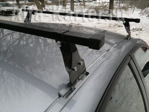 Багажник на крышу Amos Polo на штатные места для Chevrolet Orlando 5-дв. 2011-2015 (Прямоугольные дуги). Артикул polo-z1.3