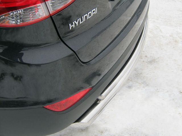 Защита RusStal заднего бампера d63/42 (дуга) для Hyundai ix35 2009-2026. Артикул HIZ-000183