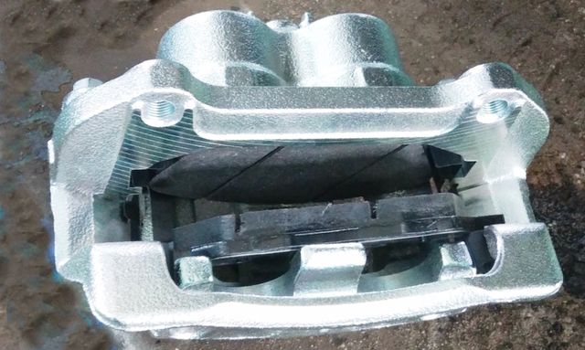 Тормозной суппорт Mando передний левый для Hyundai Santa Fe II 2006-2012. Артикул EX581102B700