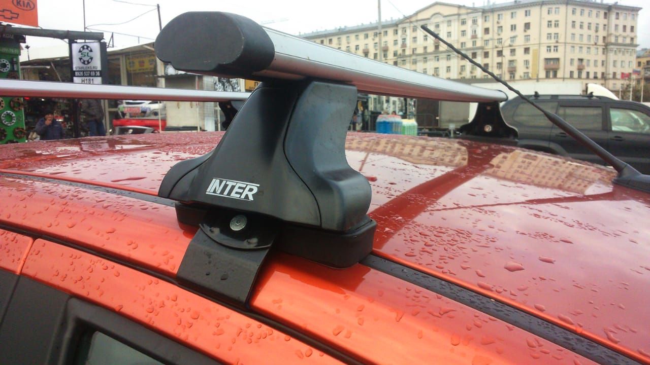 Багажник INTER на гладкую крышу для LADA Vesta седан 2015-2026 (Аэродинамические дуги дуги). Артикул 8800-1005