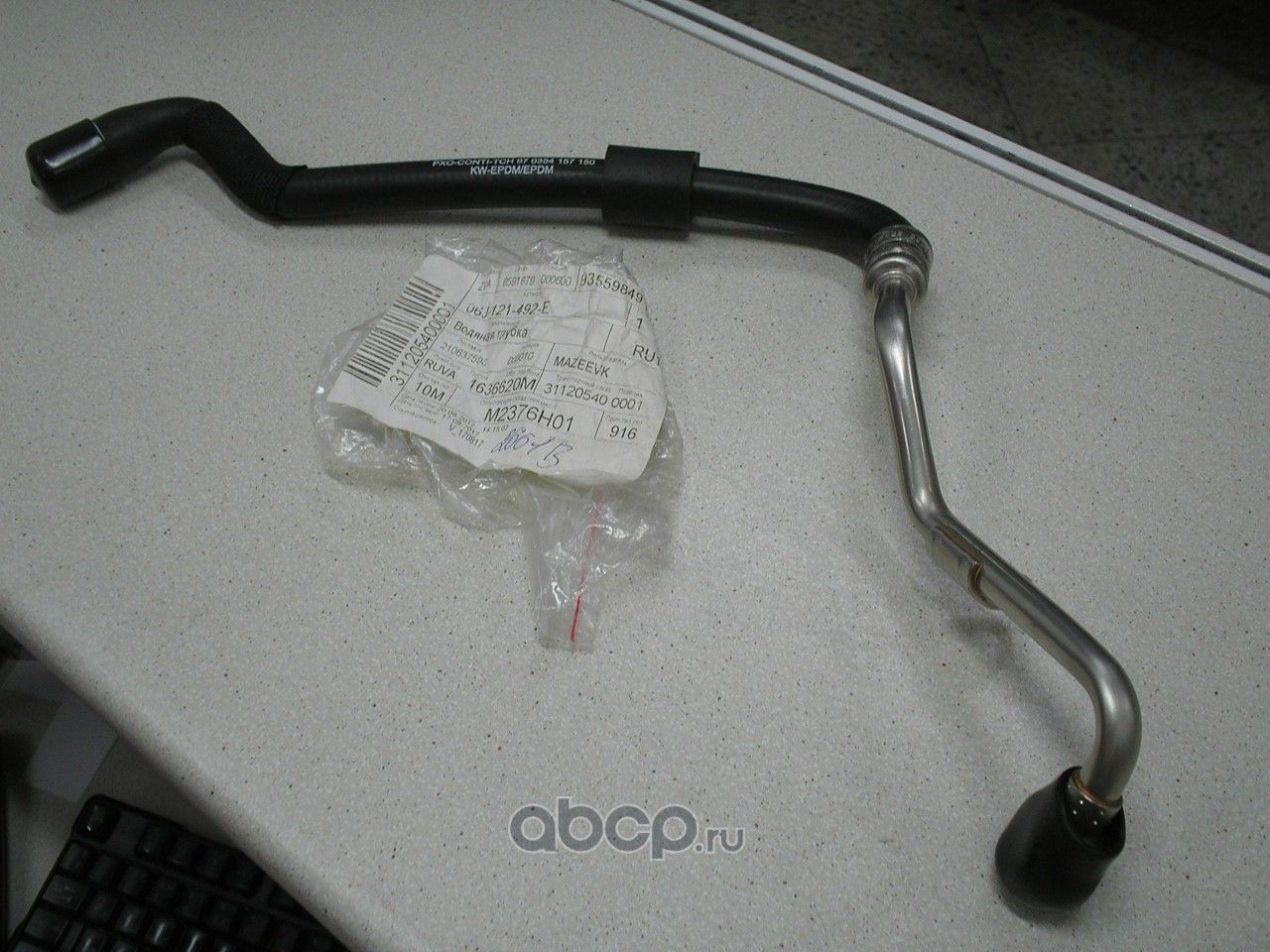 Патрубок радиатора (системы охлаждения) VAG. Артикул 06J121492E