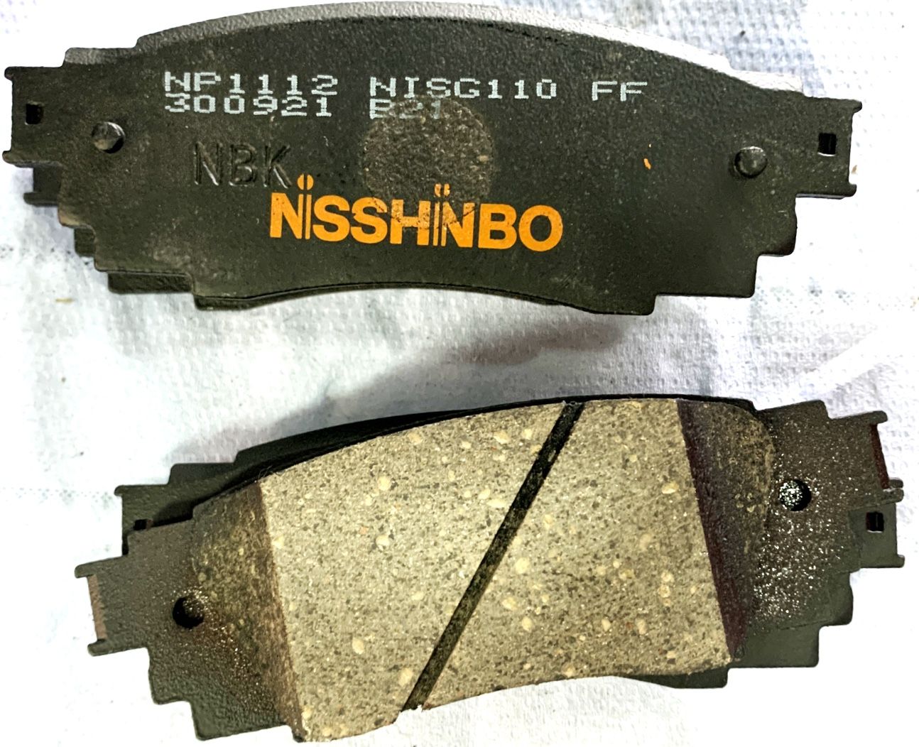 Тормозные колодки Nisshinbo. Артикул NP1112