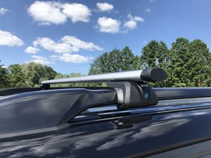 Багажник на рейлинги INTER Titan для Citroen C3 II хэтчбек 5-дв. 2009-2016 (Аэродинамические дуги) (с замком). Артикул 5522-1005