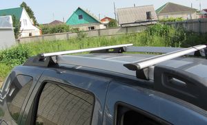 Багажник на широкие рейлинги INTER для Renault Duster 5-дв. I рестайлинг 2015-2020 (Крыловидные дуги). Артикул 5516+1205