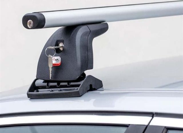 Багажник на крышу Amos Beta на штатные места для BMW X1 E84 5-дв. 2010-2015 (Аэродинамические дуги). Артикул beta-b-103-f1.2l