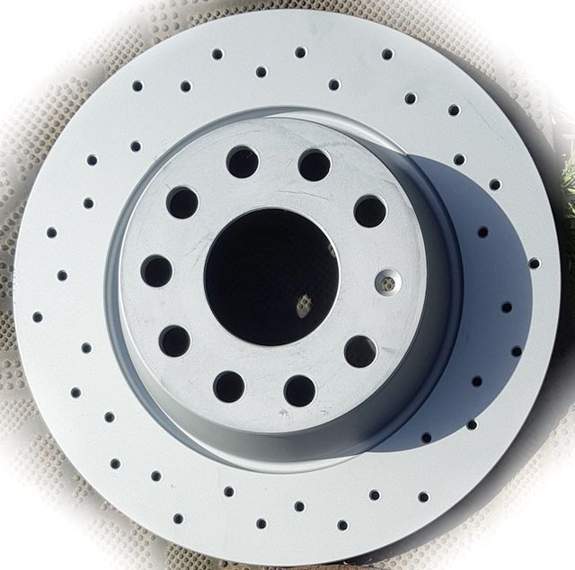 Тормозной диск Zimmermann Sport Coat Z задний для Audi A3 II (8P) 2003-2013. Артикул 100.3315.52