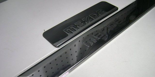Накладки Ладья на внутренние пороги (штамп) для Mazda универсальные. Артикул 014.13.28
