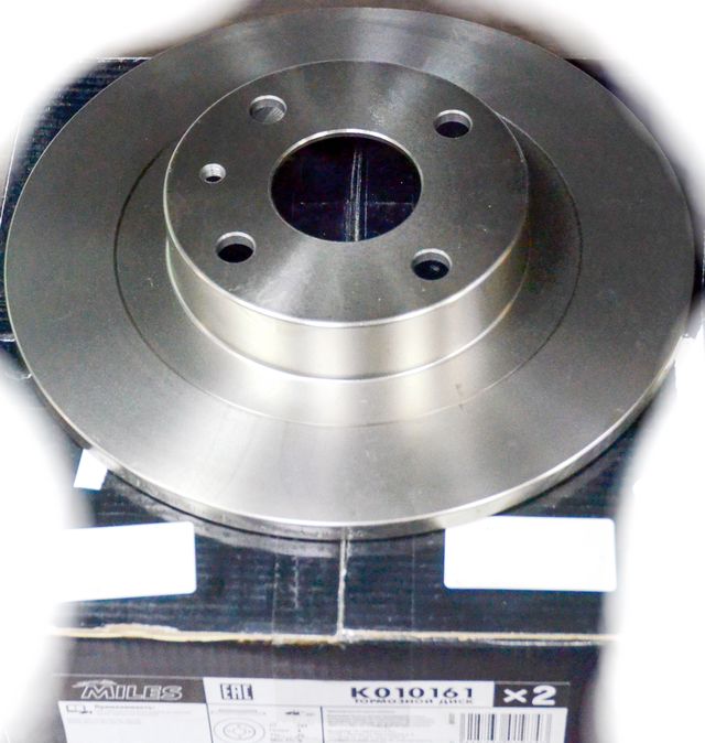 Тормозной диск Miles задний для Mazda 323 VI (BJ) 1998-2004. Артикул K010161