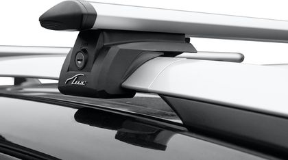 Багажник на рейлинги LUX Элегант для Skoda Fabia Scout 2009-2015 (Аэро-трэвэл дуги шириной 82 мм). Артикул 846226