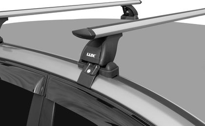 Багажник на крышу LUX креп. за дверные проемы для Hyundai Accent седан 2006-2012 (Аэро-трэвэл дуги). Артикул 690663+690014+846059