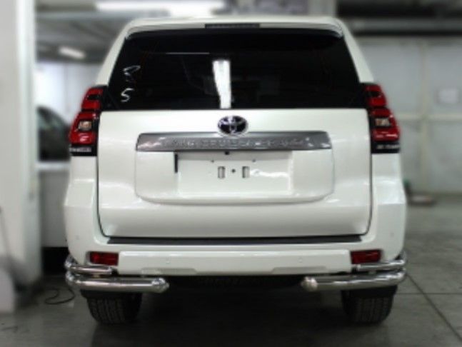 Защита Tamsan заднего бампера d76/42 углы двойные для Toyota Land Cruiser 200 2012-2015. Артикул TRG05DD7642UM.59.46