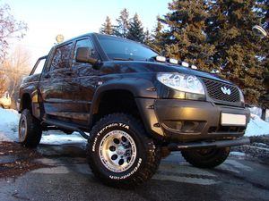 Расширители колесных арок Fenders (с накладками на передний бампер) для УАЗ Patriot пикап 2008-2026. Артикул ТКУ-31Р