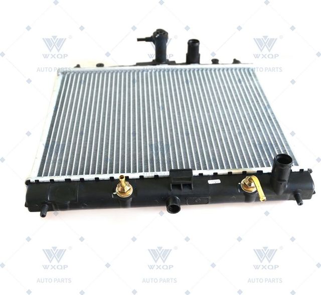 Радиатор охлаждения двигателя Wxqp для Nissan Note I 2006-2012. Артикул 42912