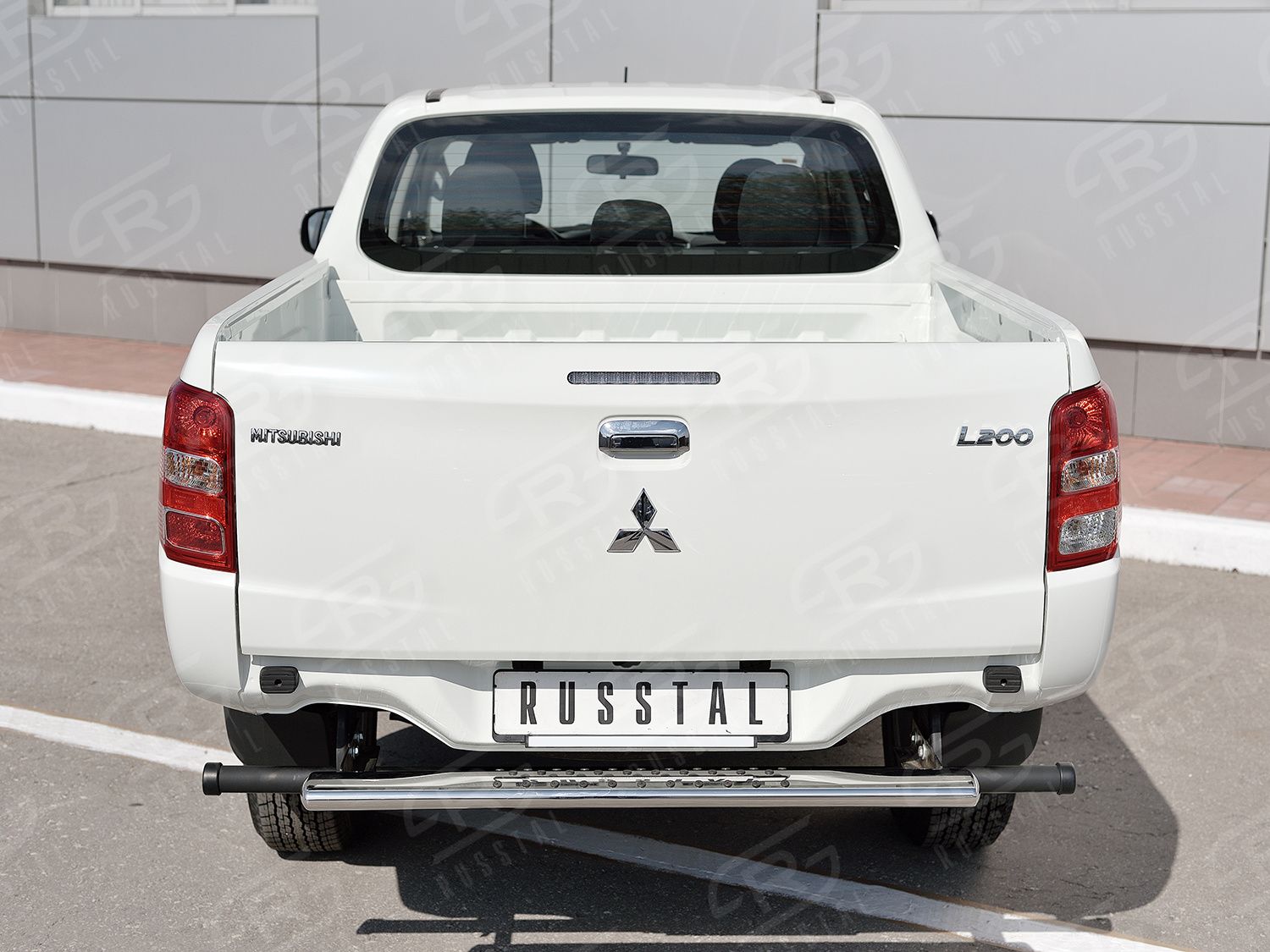 Защита РусCталь заднего бампера 120х60 с проступью для Mitsubishi L200 V 2015-2019. Артикул ML2Z-002252