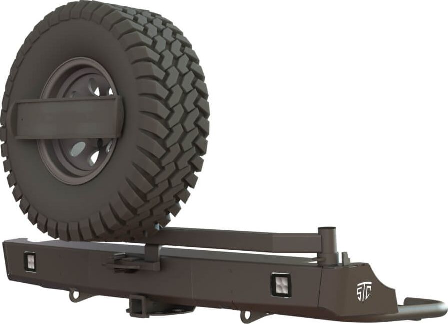 Бампер силовой STC задний для Volkswagen Amarok I 2010-2026 с квадратом под фаркоп, кронштейном крепления запасного колеса по центру, кронштейном крепления гос номера и фарами заднего хода/ ПТФ. Артикул STC-VA-BR-C1-L2