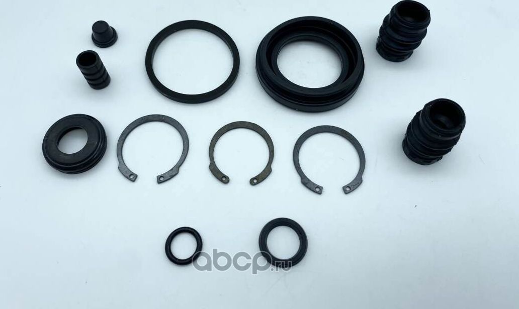 Ремкомплект тормозного суппорта заднего (для поршня d 38 mm  суппорт Lucas/Tokico) NISSAN Almera Tin (Magtechnic). Артикул mag0261rk