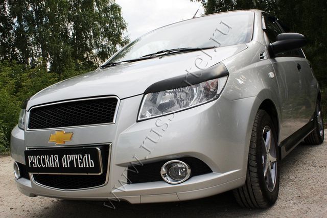 Накладки Русская Артель на передние фары (реснички) для Chevrolet Aveo I хэтчбек 3дв, 5дв 2008-2012. Артикул RECA-018600