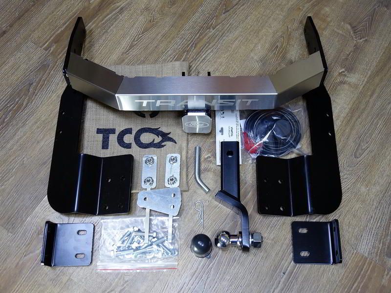 Фаркоп ТСС оцинкованный под американский квадрат с накладкой с надписью Transit для Ford Transit 2016-2026 (нерж. шар). Артикул TCU00110N