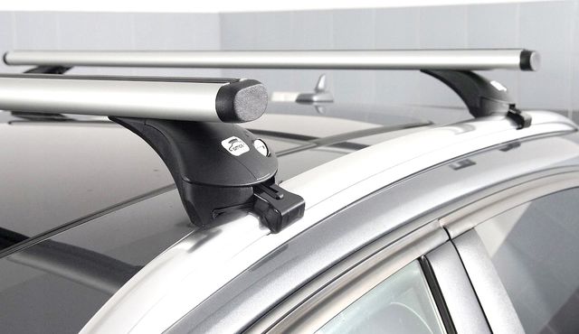 Багажник на интегрированные рейлинги Amos Boss для Haval Jolion 2021-2025 (Аэродинамические дуги). Артикул boss_f1.2