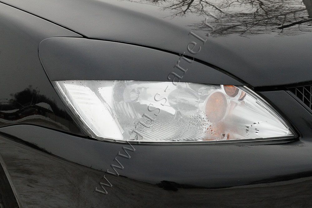Накладки Русская Артель на передние фары классик (реснички) для Mitsubishi Lancer 9 2005-2007. Артикул REML9-010300