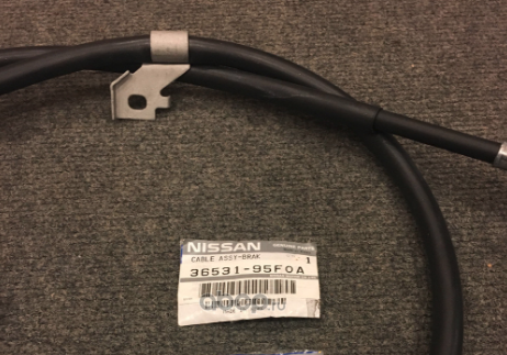 Трос ручника (тросик ручного тормоза) Nissan. Артикул 3653195F0A