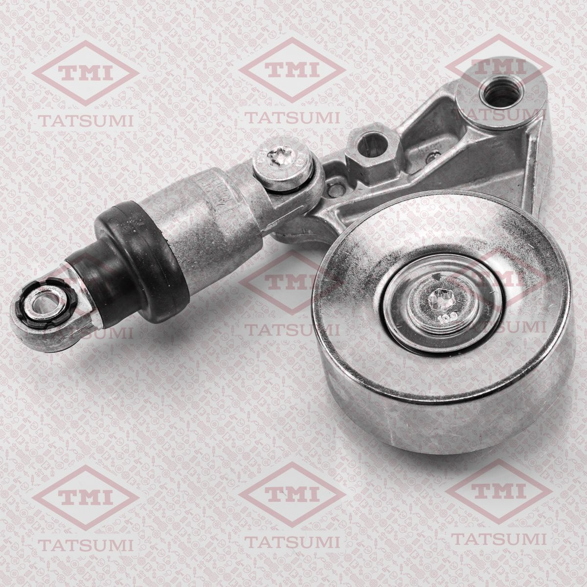 Натяжитель поликлин.ремня с роликом NISSAN Patrol/Terrano 02 (Tatsumi). Артикул TFD1078