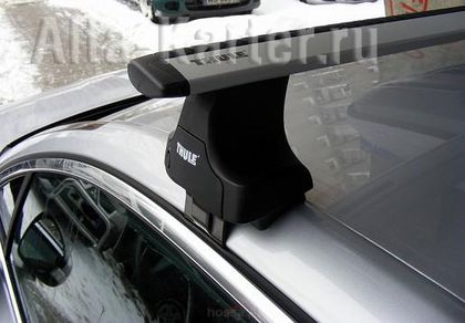 Багажник на крышу Thule WingBar креп. за дверные проемы для Rover 45 седан, хэтчбек 5-дв. 2000-2005 (Wingbar дуги). Артикул 961-754-1045