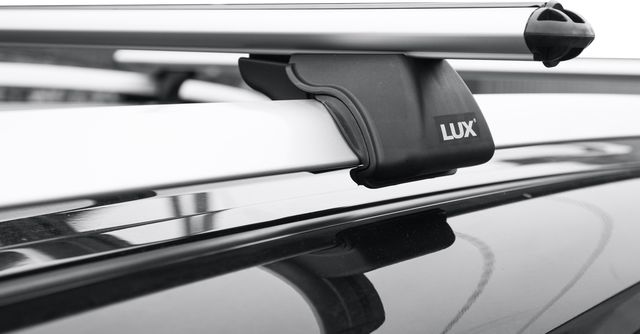 Багажник на рейлинги LUX Классик для Ford Explorer V 2010-2019 (Аэродинамические дуги шириной 53 мм). Артикул 842549