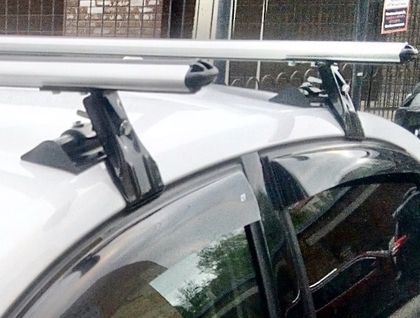 Багажник на крышу Муравей Д-2 креп. за дверные проемы для Hyundai Pony седан, хэтчбек 1994-1999 (Аэро-классик дуги). Артикул 691486+698874
