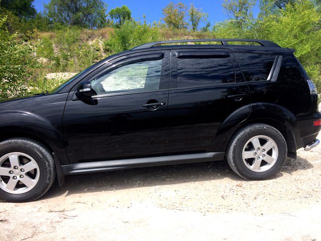 Дефлекторы SIM для окон Mitsubishi Outlander XL 2007-2012. Артикул SMIOUT0732