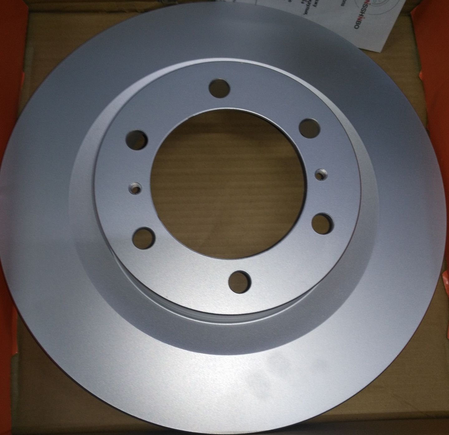 Тормозной диск Nisshinbo. Артикул ND1058K