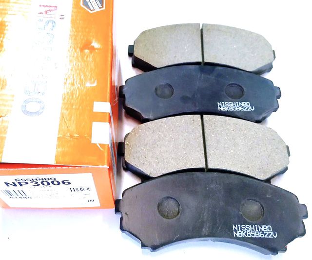 Тормозные колодки Nisshinbo передние для Mitsubishi Pajero IV 2006-2025. Артикул NP3006