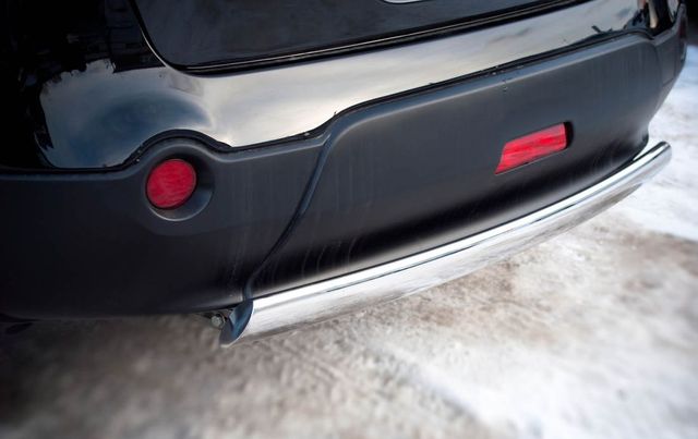 Защита RusStal заднего бампера d75х42 овал (дуга) для Nissan Qashqai+2 2008-2010. Артикул QNZ-001778