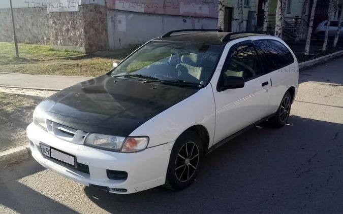 Nissan Pulsar N15 (Установка бигалогенных линз)