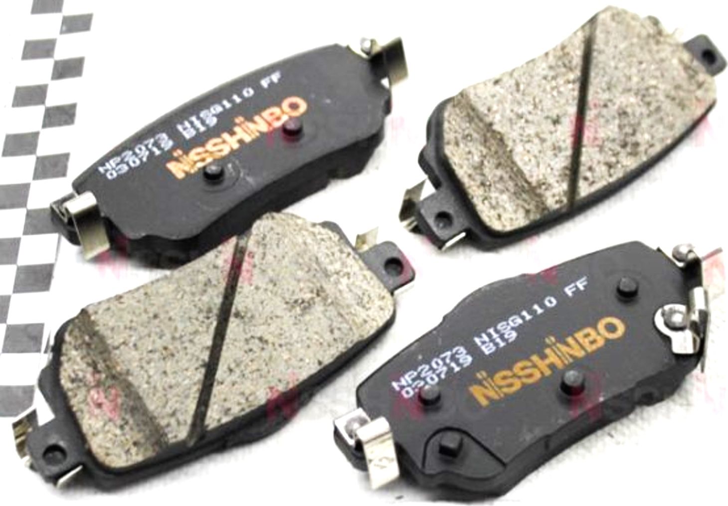 Тормозные колодки Nisshinbo. Артикул NP2073